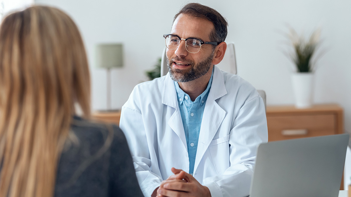 Doctor explains medical treatment to patient in the consultation